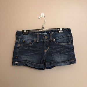 low-rise dark wash jean shorts